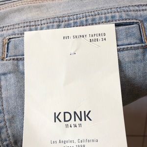These are KDNK skinny jeans